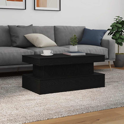 Couchtisch mit LED-Leuchten Schwarz Eichen-Optik 90x50x40 cm