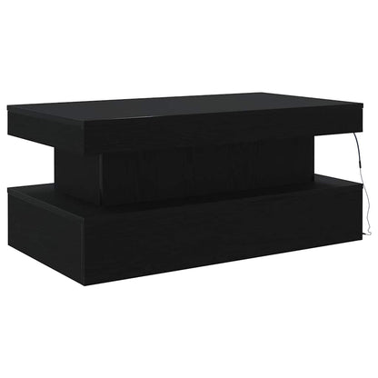 Couchtisch mit LED-Leuchten Schwarz Eichen-Optik 90x50x40 cm