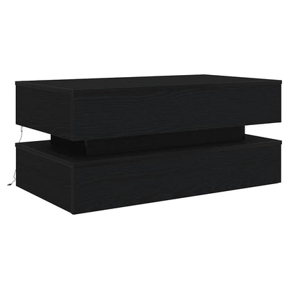 Couchtisch mit LED-Leuchten Schwarz Eichen-Optik 90x50x40 cm