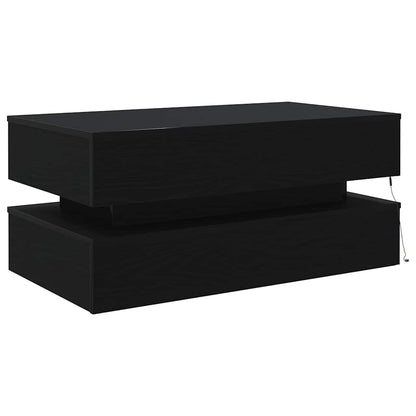 Couchtisch mit LED-Leuchten Schwarz Eichen-Optik 90x50x40 cm