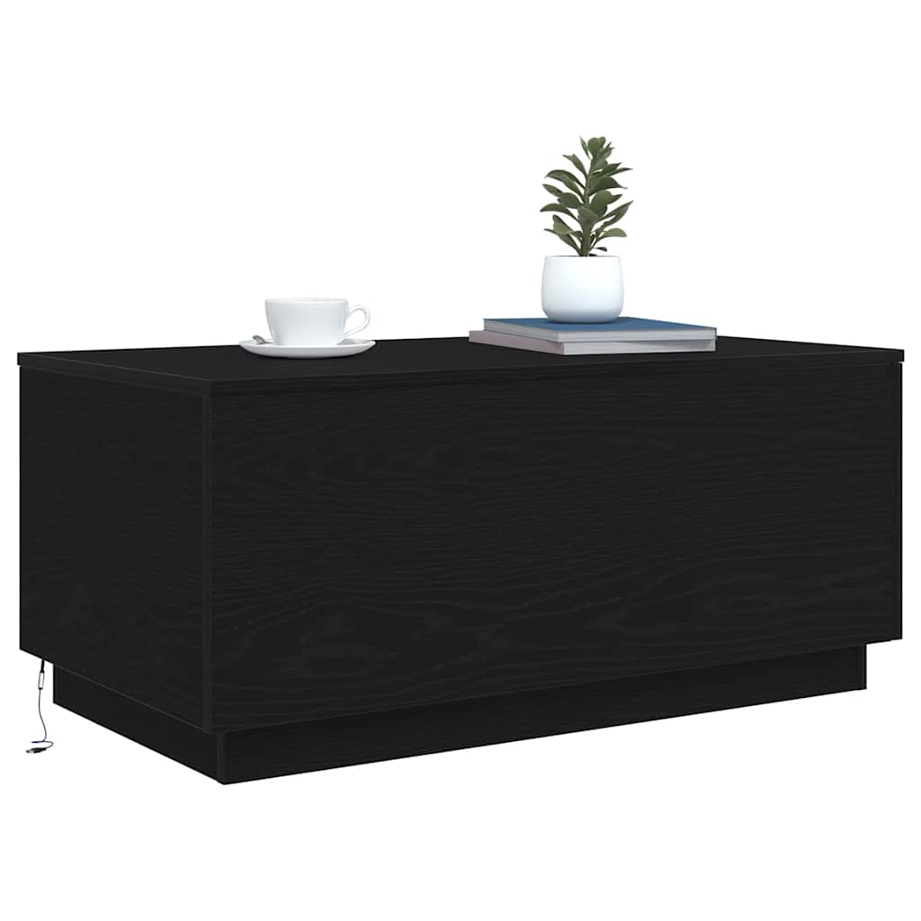 Couchtisch mit LED-Leuchten Schwarz Eichen-Optik 90x50x40 cm