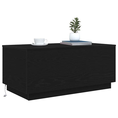 Couchtisch mit LED-Leuchten Schwarz Eichen-Optik 90x50x40 cm